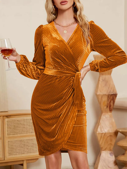 close-up of hidden snap on surplice neckline tie waist dress