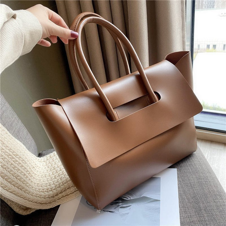 women shoulder bag side profile showing balanced proportions and soft structure