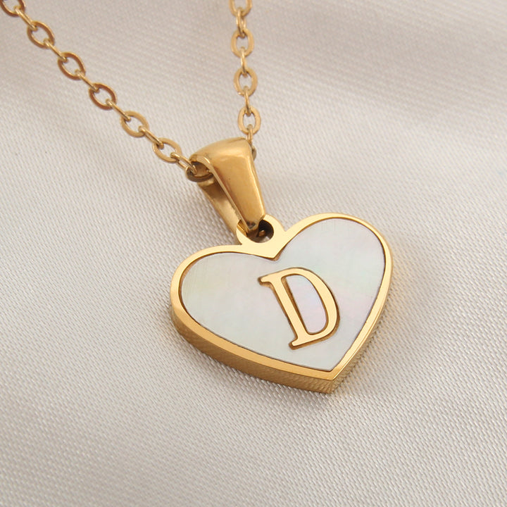Gold-plated initial necklace with heart-shaped pendant, 45+5 cm chain and stainless steel construction - For online shopping.