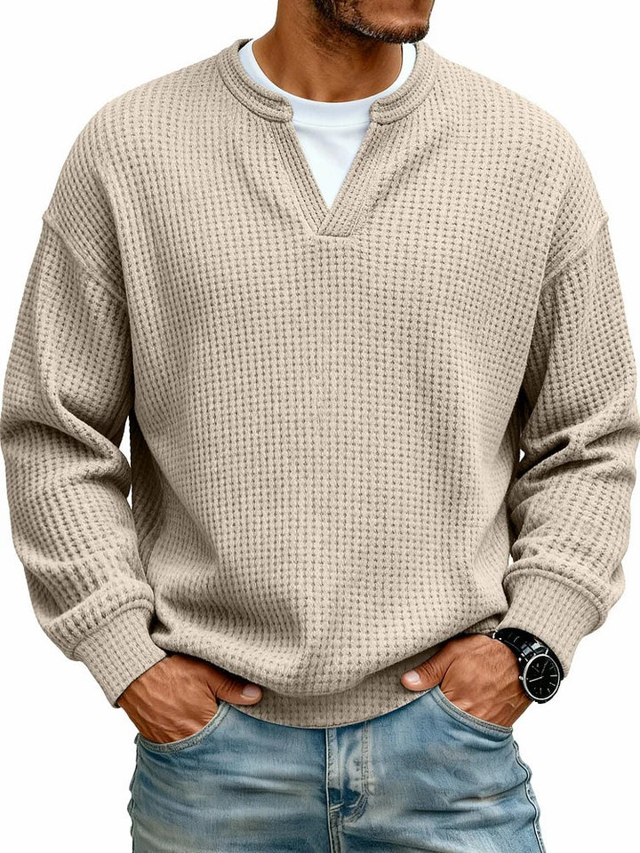 Men’s waffle shirt in a studio setting showing long sleeves and comfortable everyday structure
