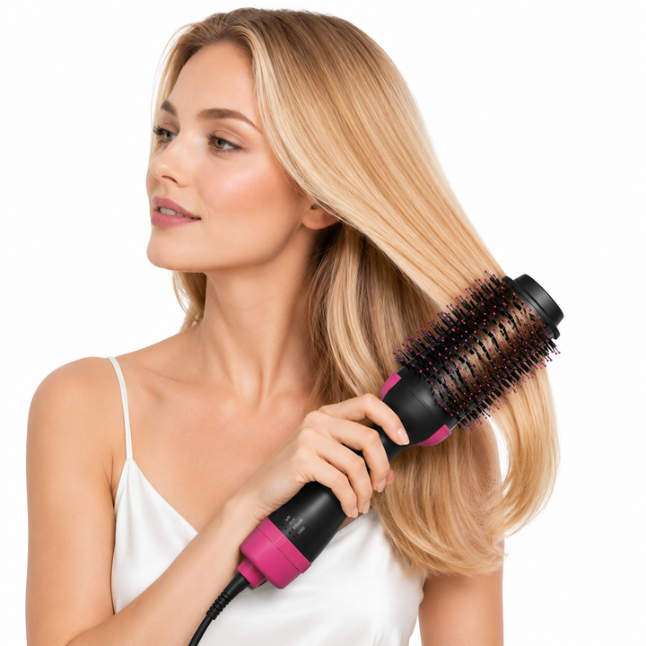 Hot air styling brush close-up showing comb teeth and smooth design