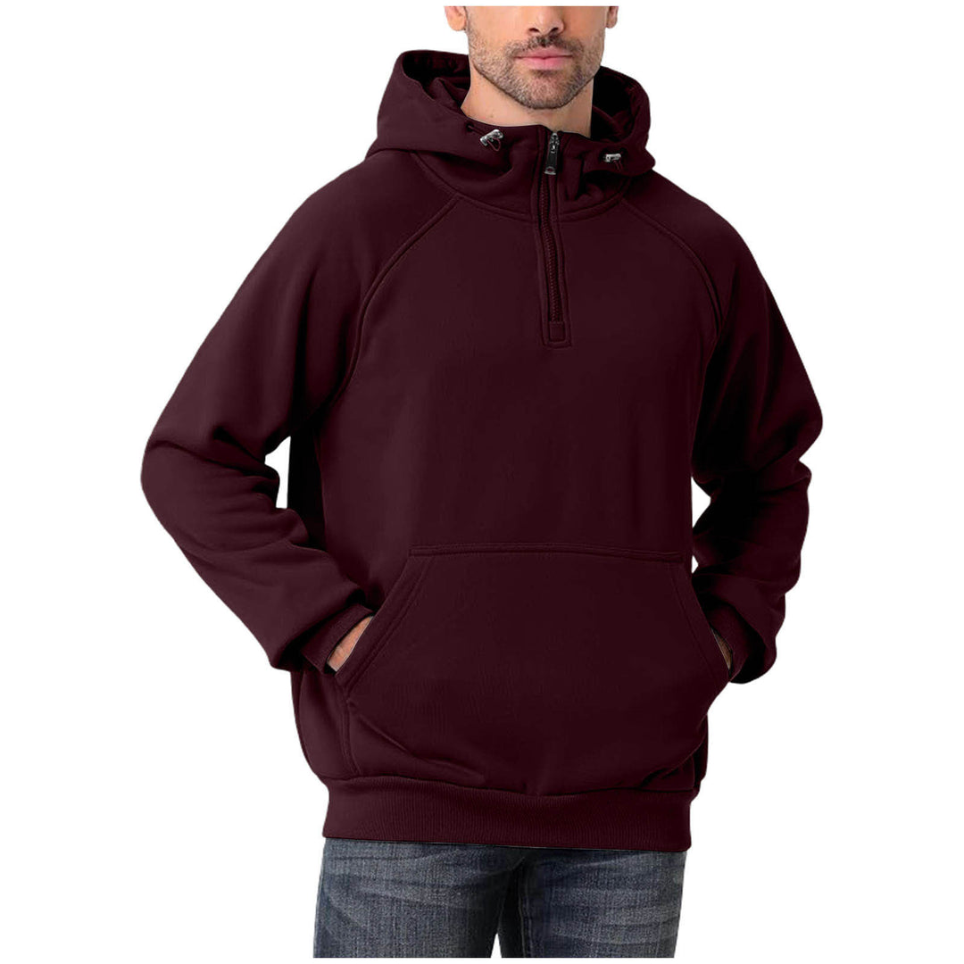 Maroon hoodie worn by a person on a white background