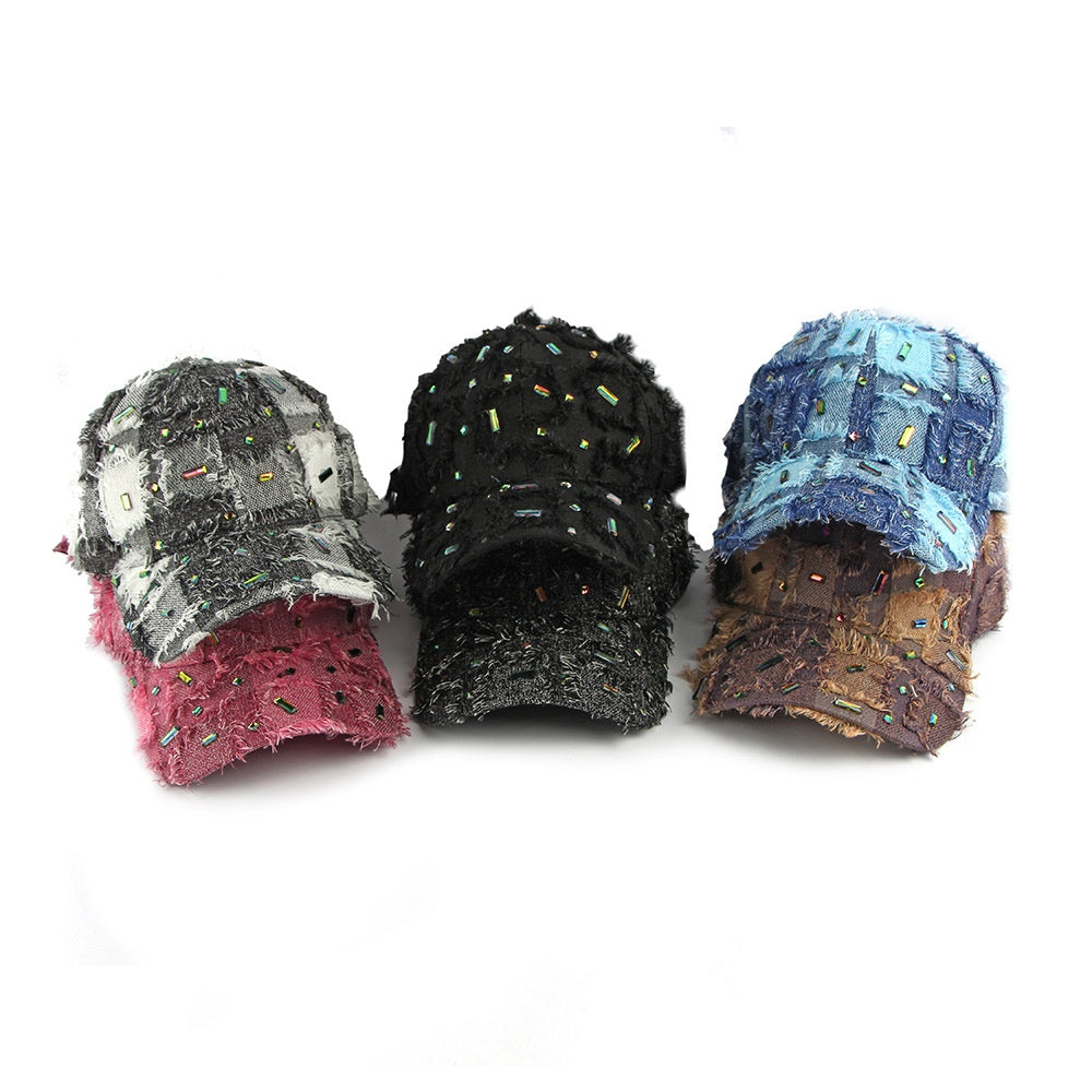Premium distressed baseball cap with decorative crystal accents worn by fashion model for urban street style inspiration