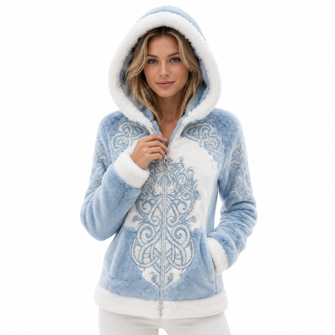 Hooded winter coat for women styled with jeans and winter boots for cold days