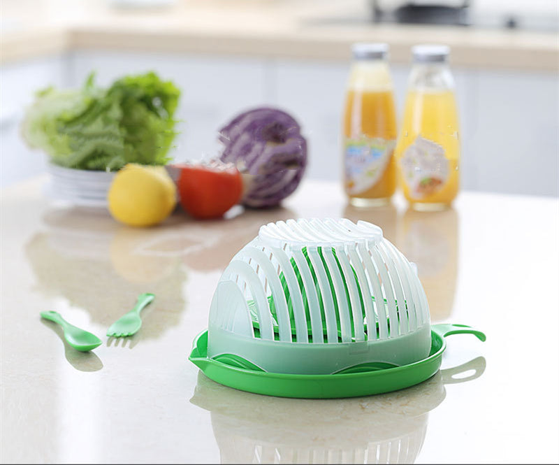 Salad cutter bowl base inverted as a serving plate holding chopped colorful veggies
