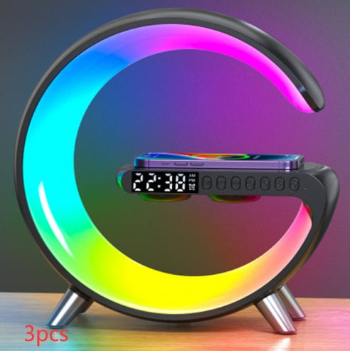 Light grey atmosphere lamp with dimmable brightness, ten color modes, Bluetooth speaker, clock and wireless charging feature.
