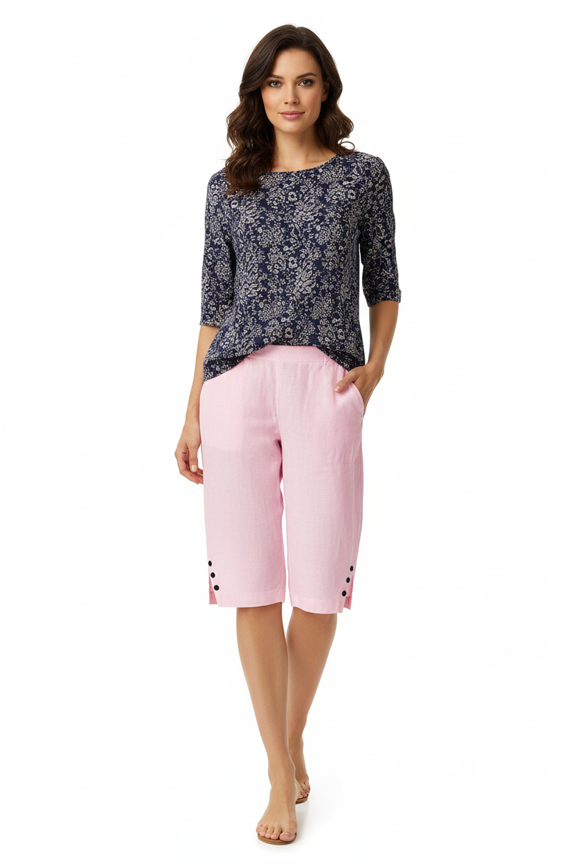 Women's linen shorts apricot color, wide leg cropped cut, drawstring detail, natural texture close-up, breathable summer bottom
