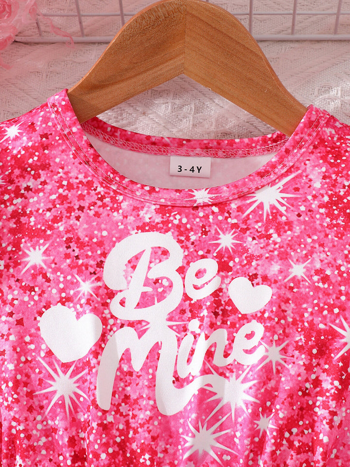 Close-up of sequin bodice and short puff sleeves on a cute girls party dress with soft gathered waist