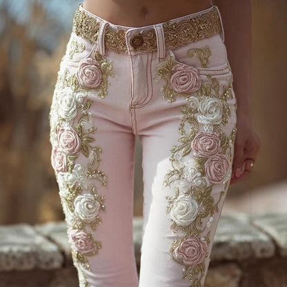 Pink rose embroidered jeans side angle highlighting stitching and 3D rose print, women’s artistic denim trousers
