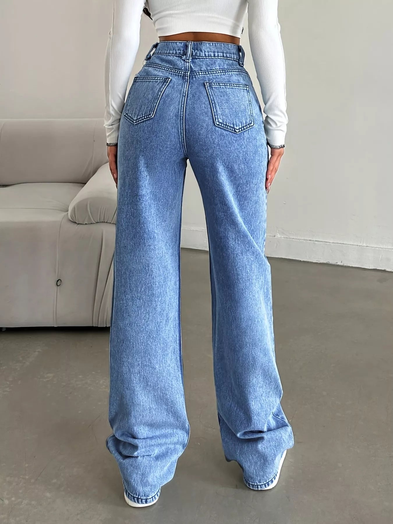 ultra high rise jeans wide leg fit shown on model with cropped sweater for modern quiet luxury vibe daily
