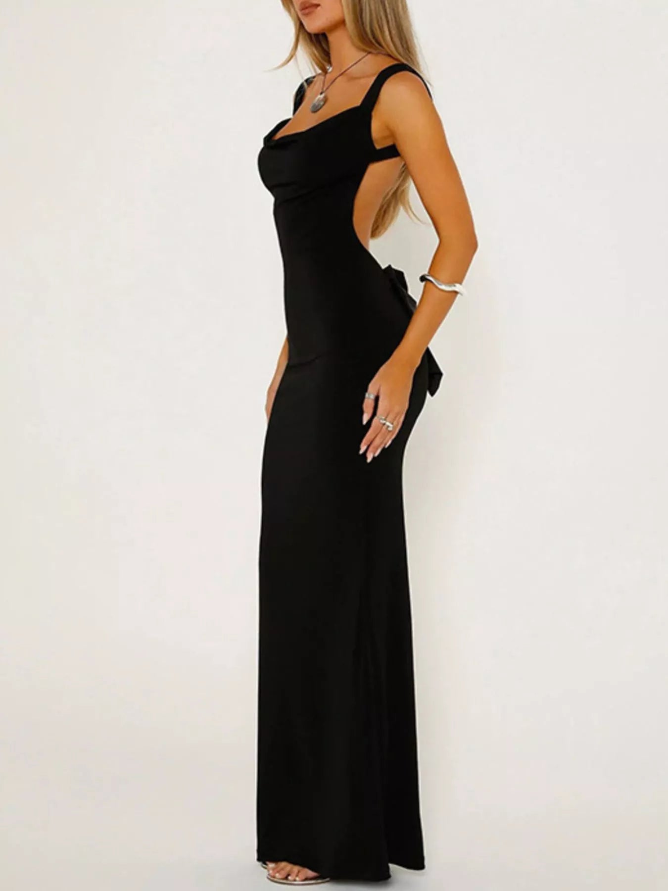 Open back maxi dress with bow accent and wide straps, elegant long length for parties and formal events
