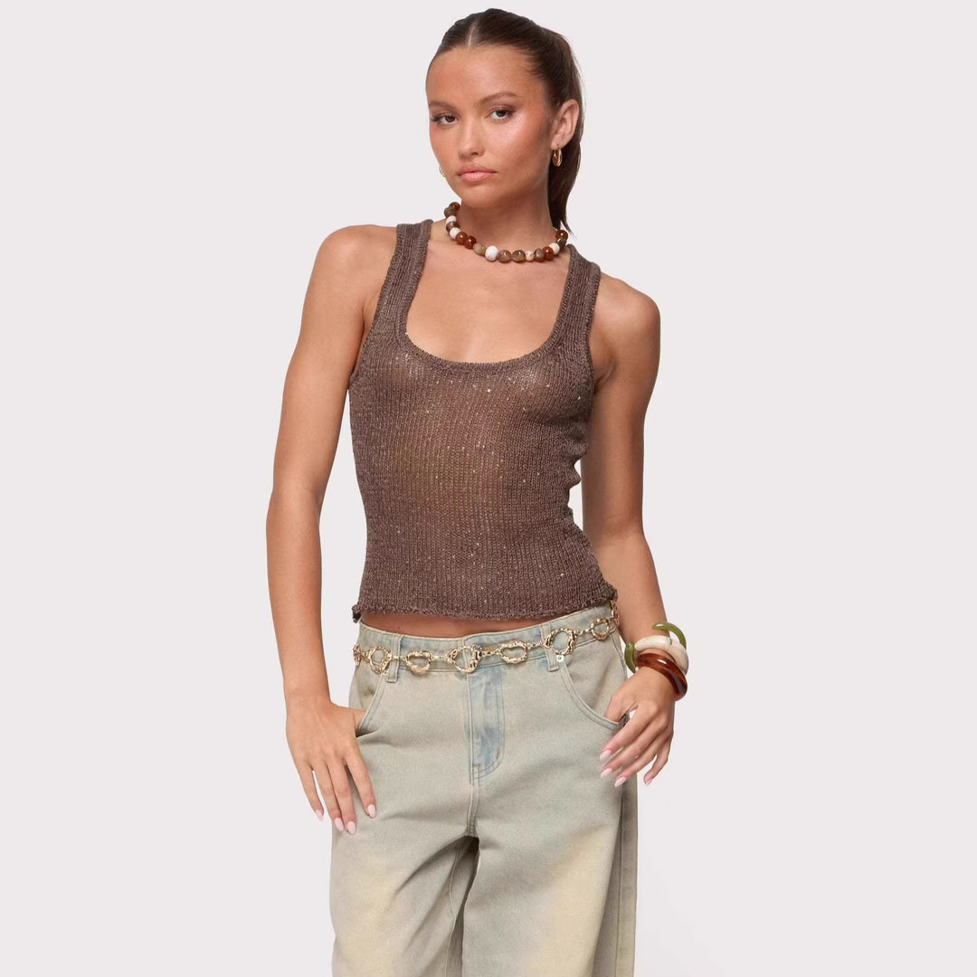Sparkly sleeveless top with fitted cut, soft stretch feel, and clean online store presentation