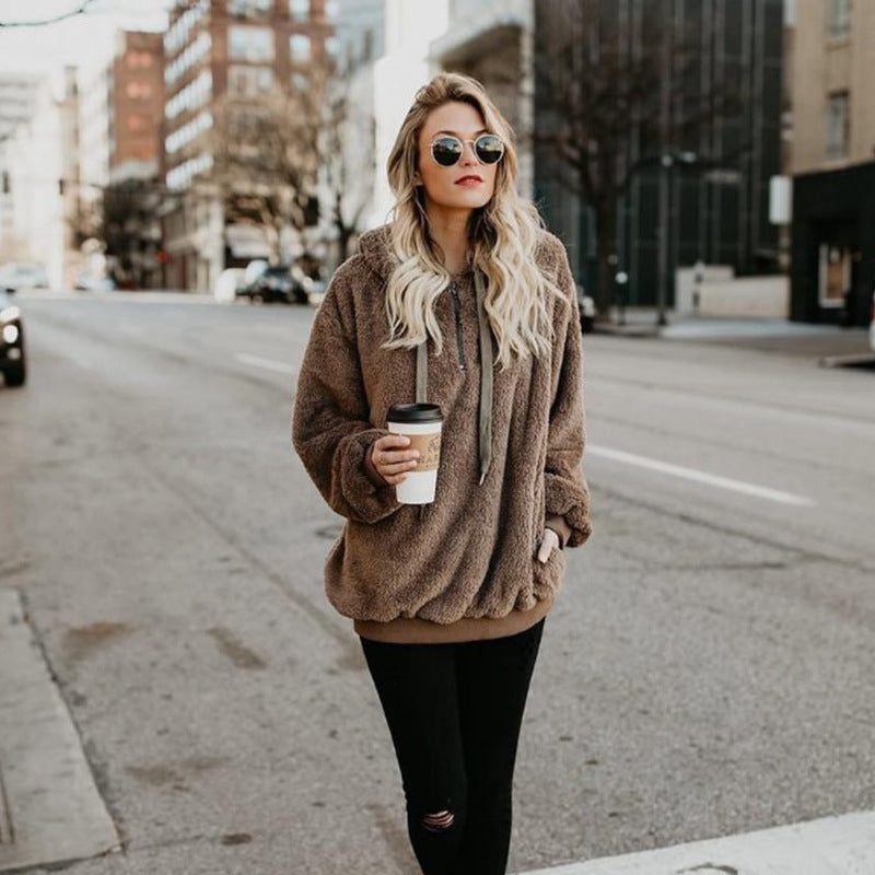 women’s fleece hoodie green relaxed silhouette side angle natural light context