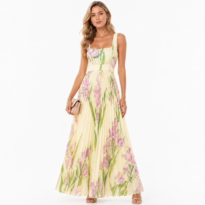 Floral summer dress for women with high waist shape and flowing pleats on model