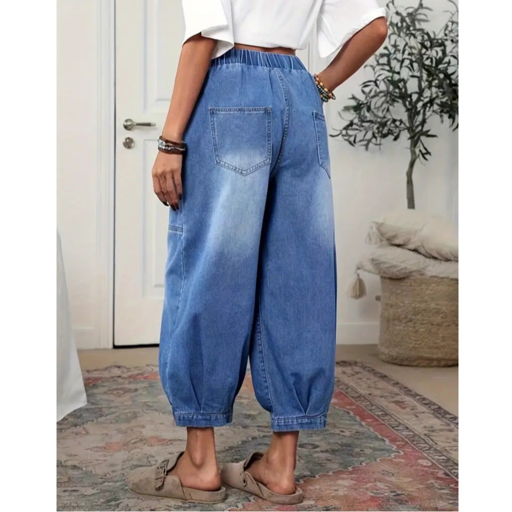 Relaxed barrel-leg denim capri pants shown from waist to hem