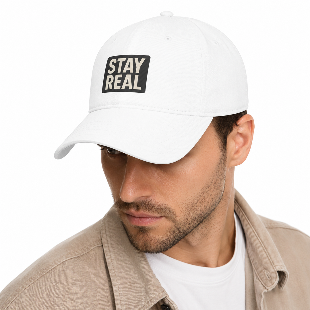 Low profile cotton baseball cap with Stay Real design, durable stitching, soft structure and easy unisex everyday fit to wear