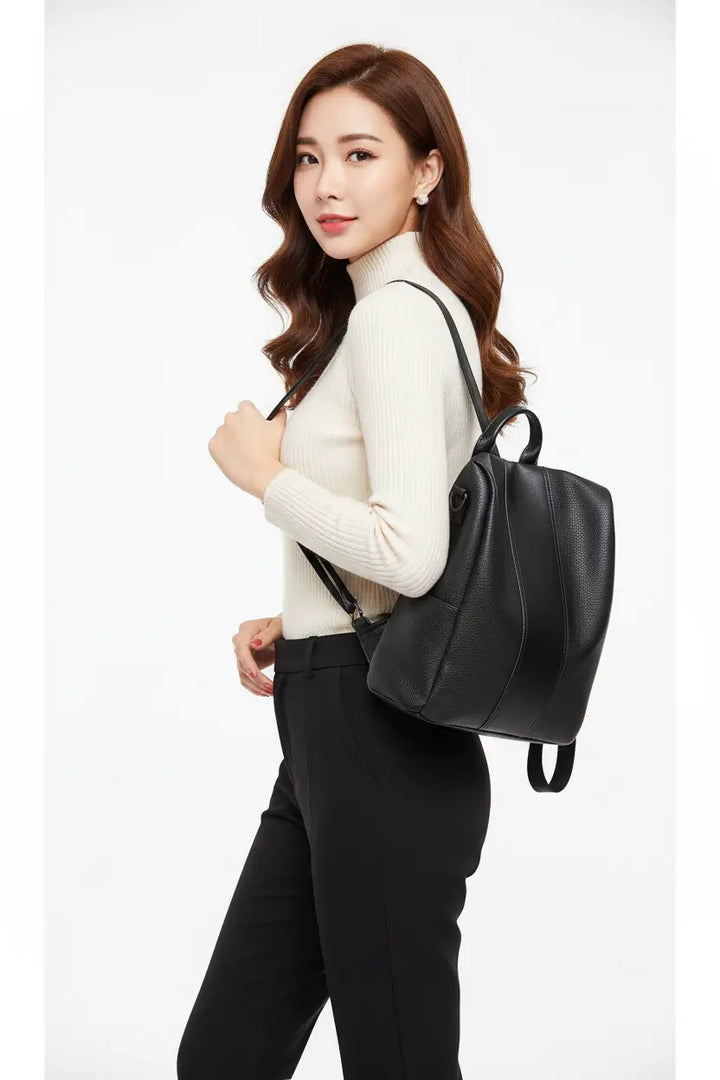 women's solid color large capacity backpack top handle close-up refined PU leather texture