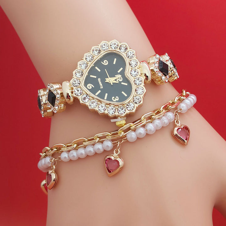 Black dial heart bracelet watch for women with sparkling stones and gold link strap, chic romantic heart watch bracelet