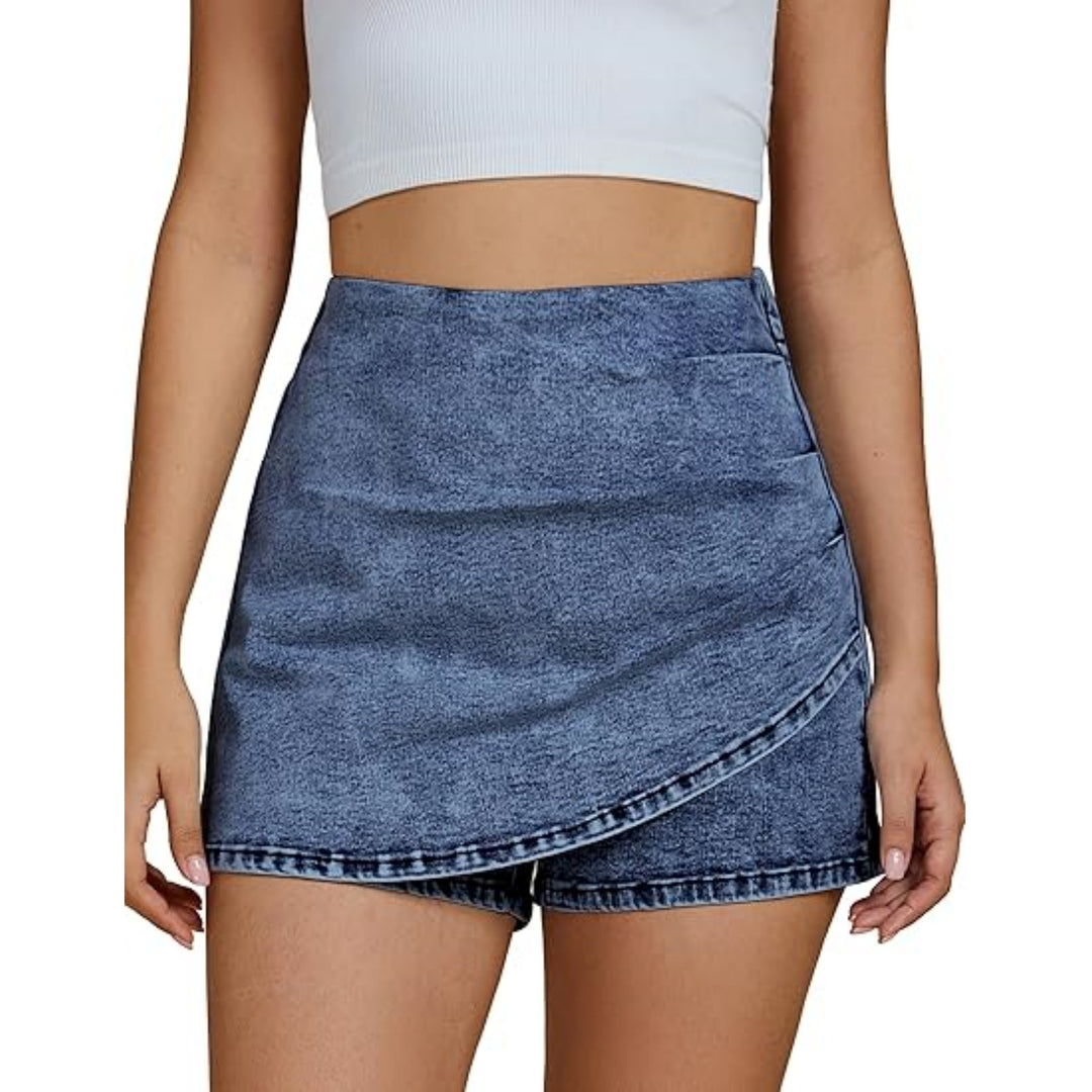 high waisted stretch denim shorts light blue fabric close up texture detail on pleats and waistband revealing soft cotton hand feel and moderate stretch for high rise commuter shorts style in natural dayligh