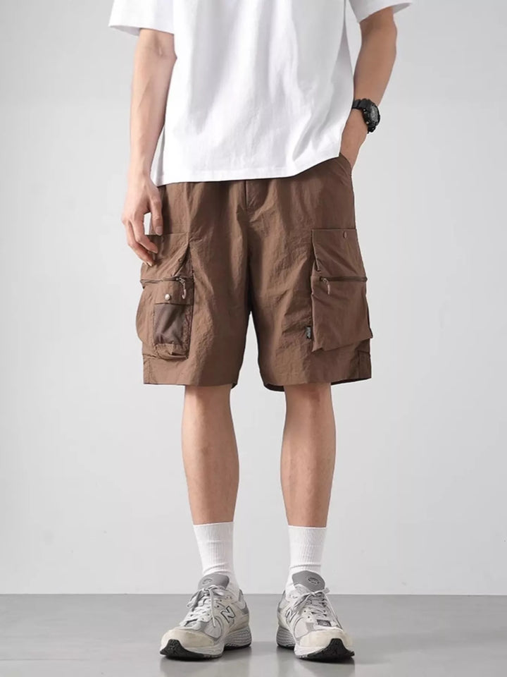 Men’s work shorts with multiple pockets shown in a simple product layout