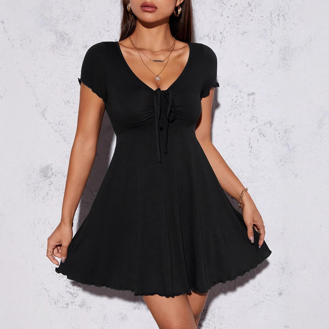 Lightweight knitted midi dress with feminine shape and clean lines for effortless day to night transitions