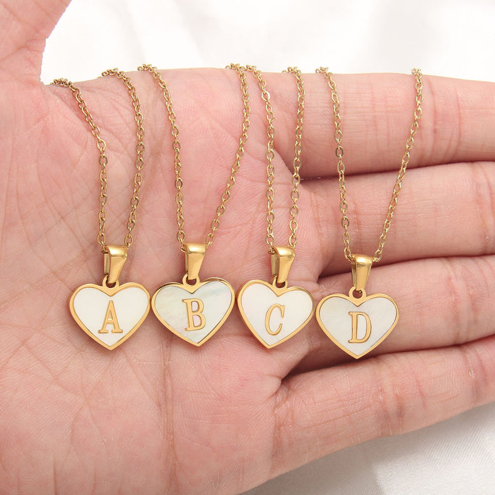 Gold-plated heart pendant necklace with selectable initial letters A to Z and stainless steel construction - Online shopping.