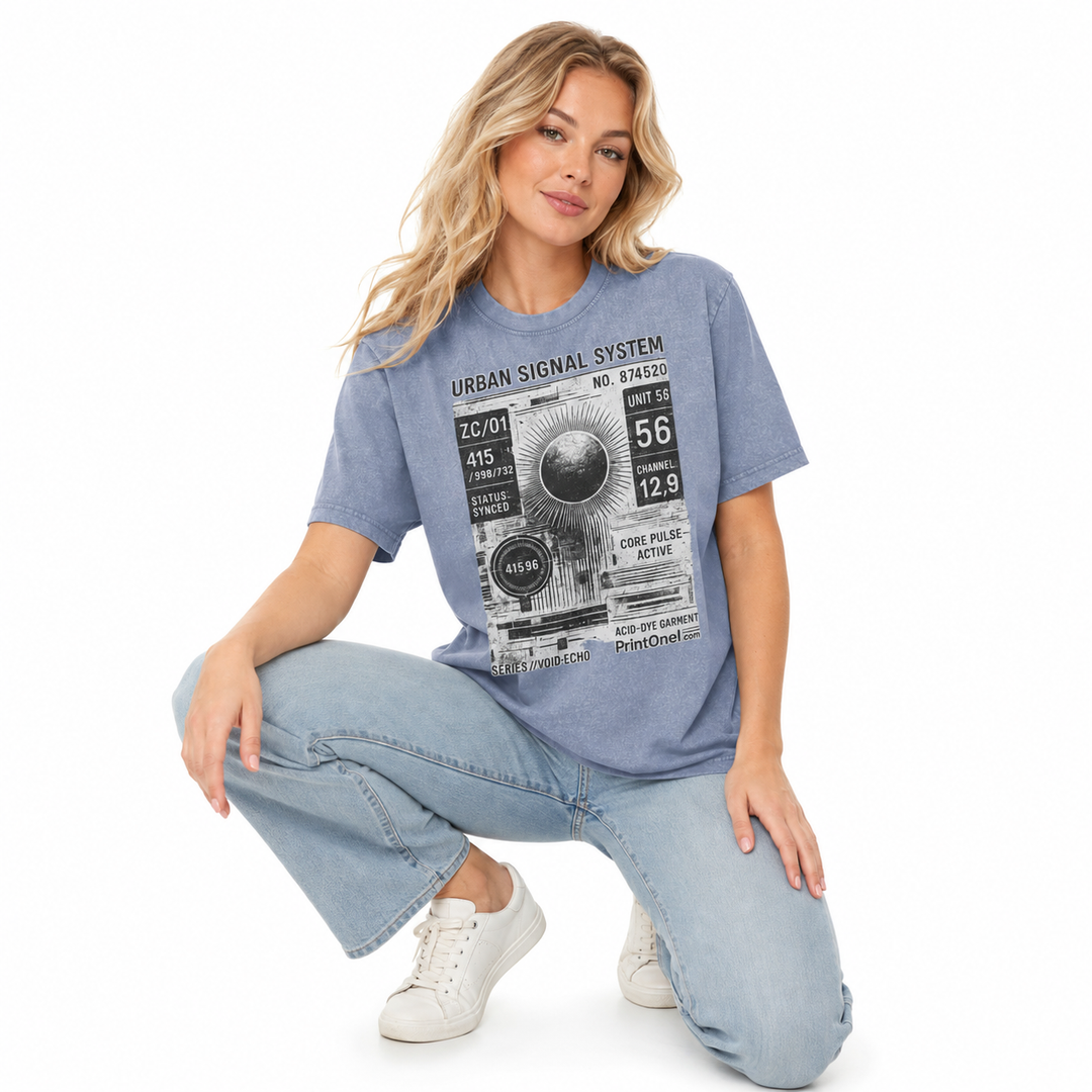 Woman wearing the vintage blue graphic streetwear T shirt in a close commercial pose highlighting the print and washed finish.