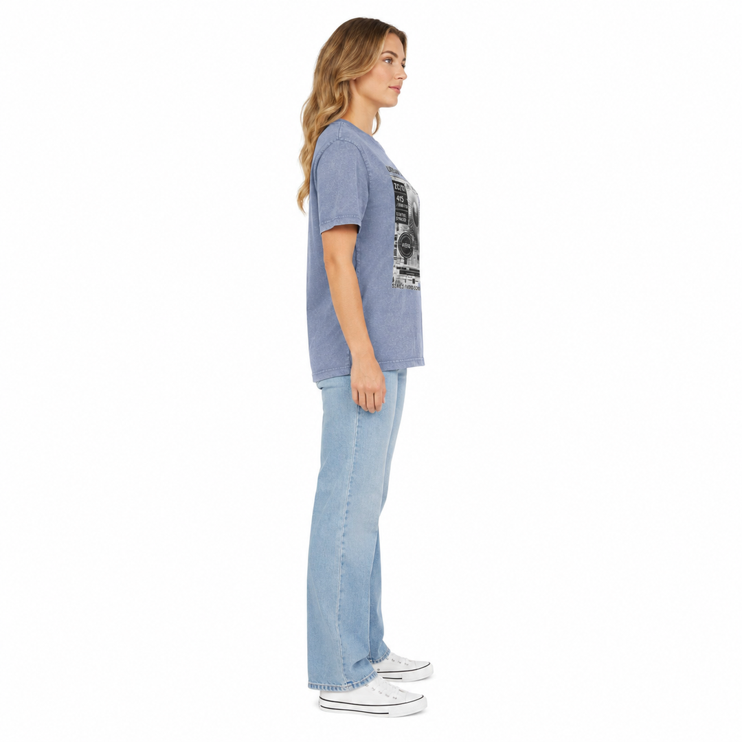 Side view of a woman wearing the vintage blue acid wash graphic T shirt, showing the relaxed silhouette and sleeve length.