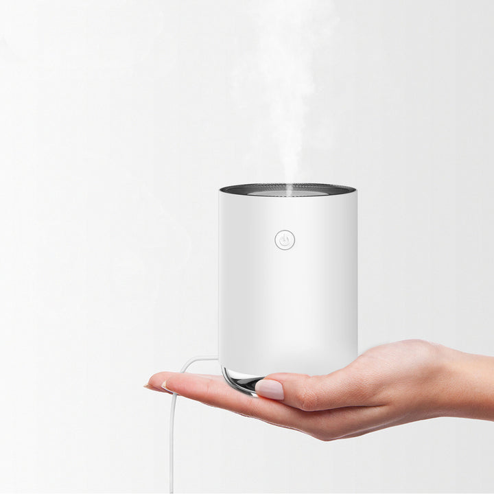 Desk humidifier product image with night lighting, DC5V operation, 2W rated power and 35-45 ml/h spray for home decor spaces.