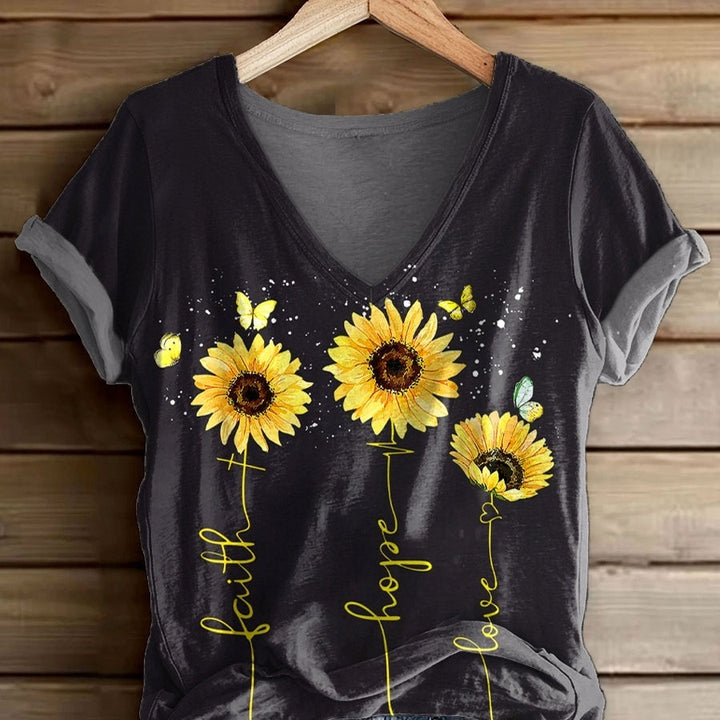 Original supplier photo of the black sunflower V-neck T-shirt with gray sleeve edges and faith, hope and love print