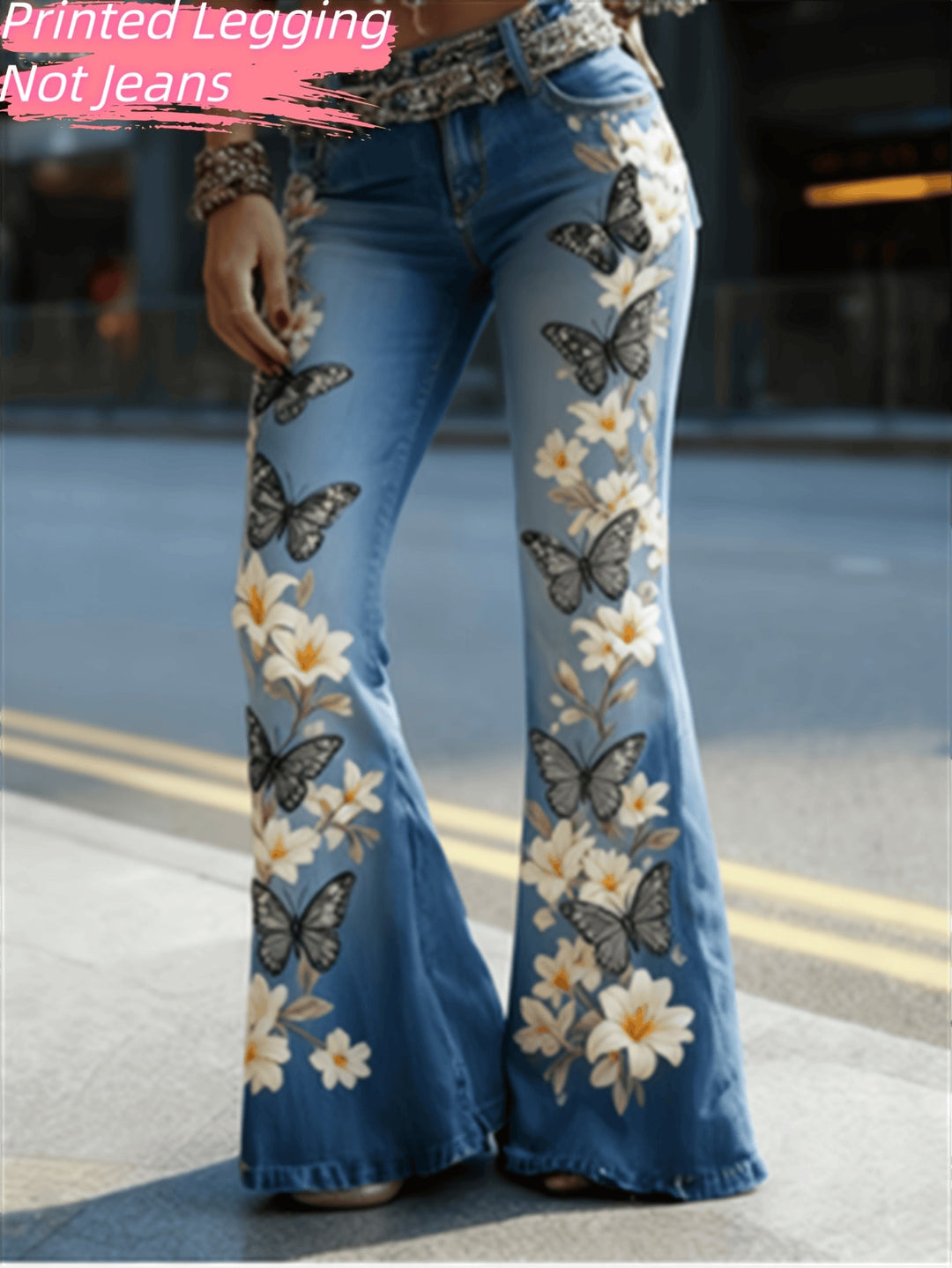 womens flared jeans western-inspired geometric panels on light blue wash, dramatic bell bottom leg shape
