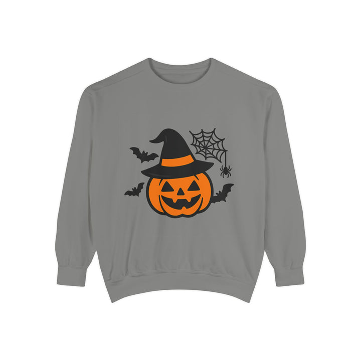 Detail view of Halloween graphic with pumpkin, witch hat, bats and spider web elements on the sweatshirt front design detail.