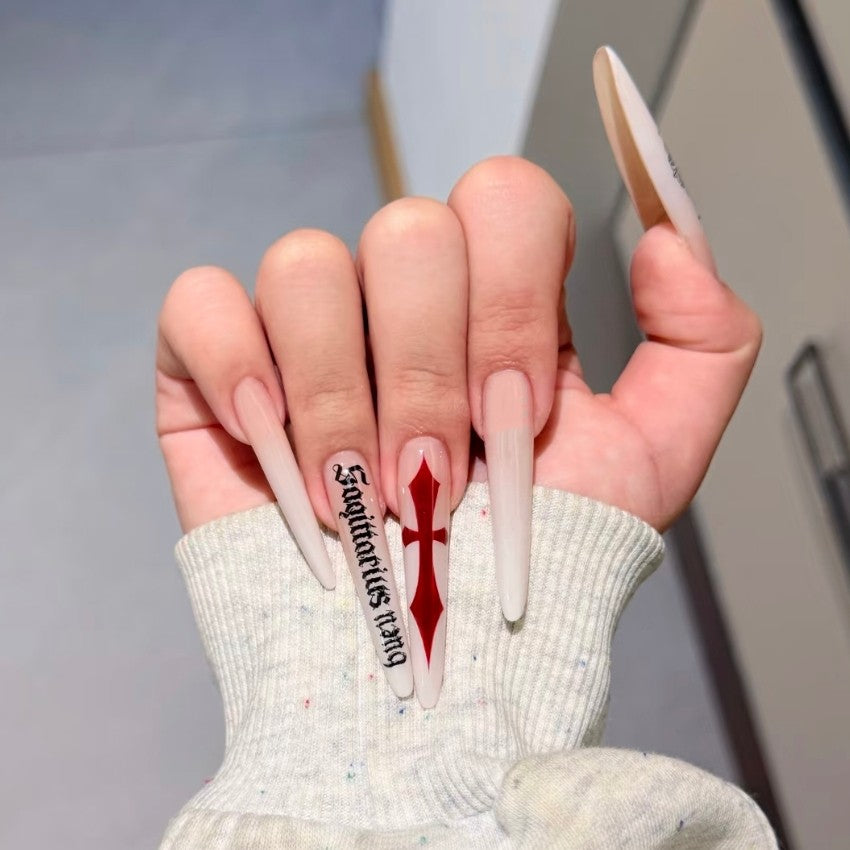 White press on nails product image with milk-white cross design