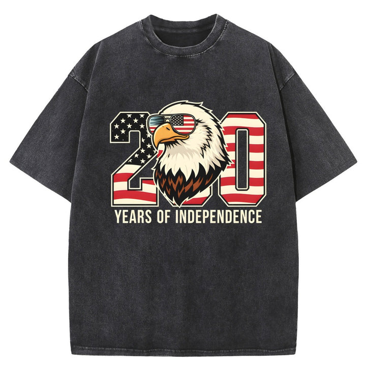 Oversized heavyweight cotton T-shirt featuring vintage American flag graphic and relaxed unisex everyday comfort