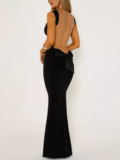 Backless maxi dress rear bow tie detail, slightly stretchy waist-to-hip fit with wide strap support all night
