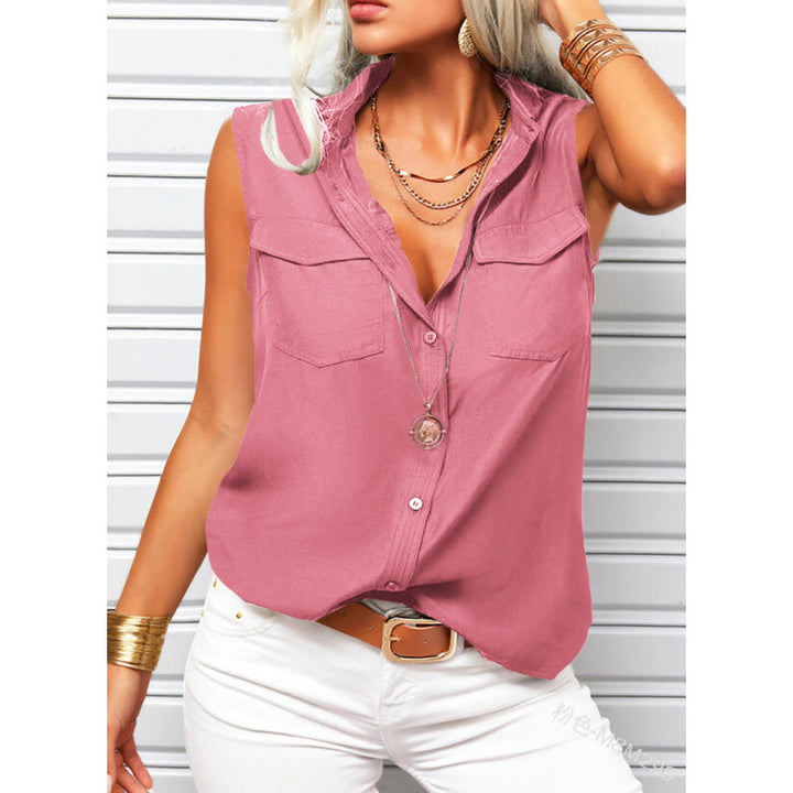 Woman wearing a pink sleeveless button-up shirt with white pants against a light background
