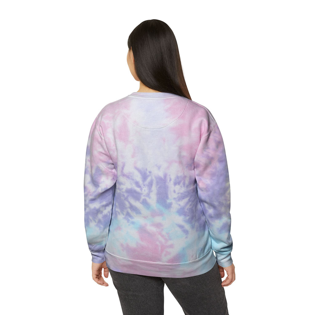 A man and woman standing side by side in pastel tie-dye sweatshirts with cloud graphics on a white background.

