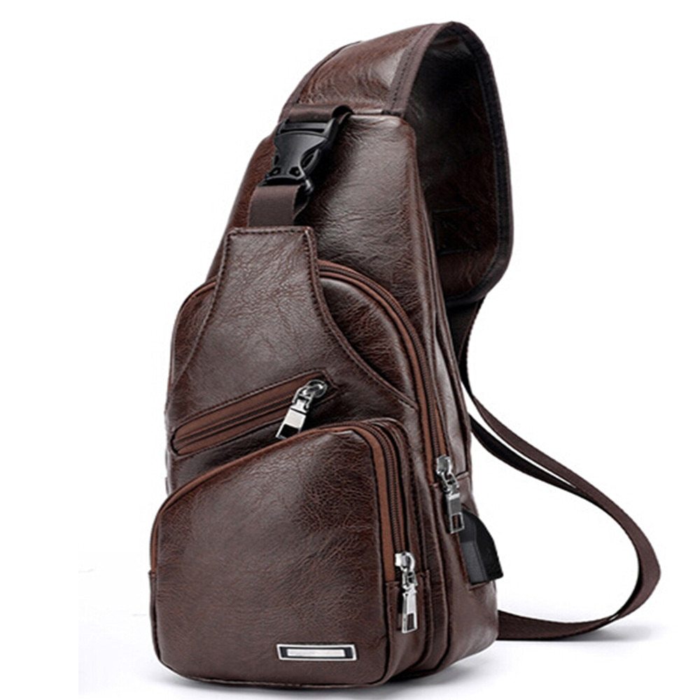 A model showcasing the comfortable, ergonomic fit of the one-shoulder waterproof messenger bag while navigating a busy city street.

