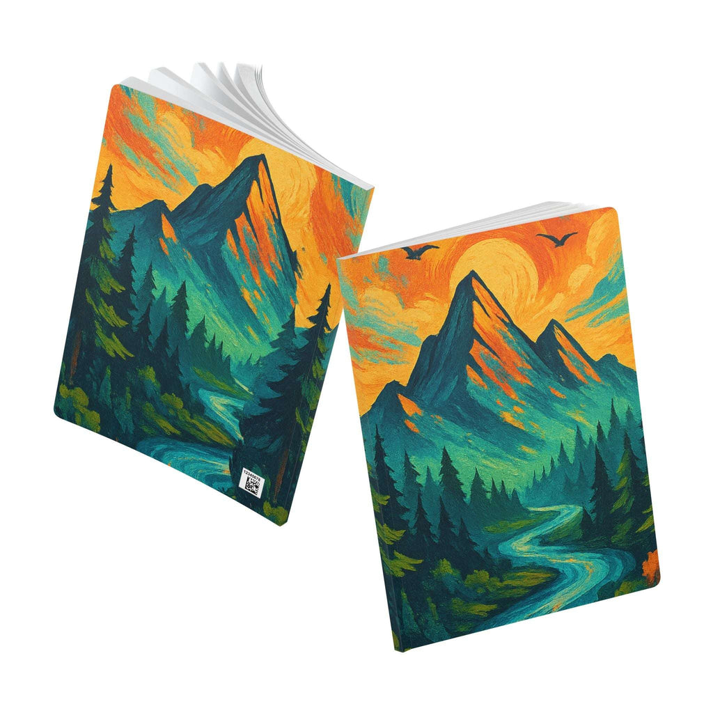 Softcover travel journal surrounded by plants and natural elements

