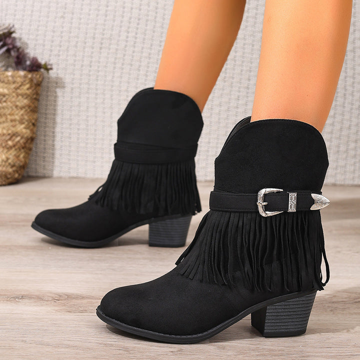 Light Brown suede ankle boots showing fringe detail and slip-on boot shape, shown for product detail reference product image.