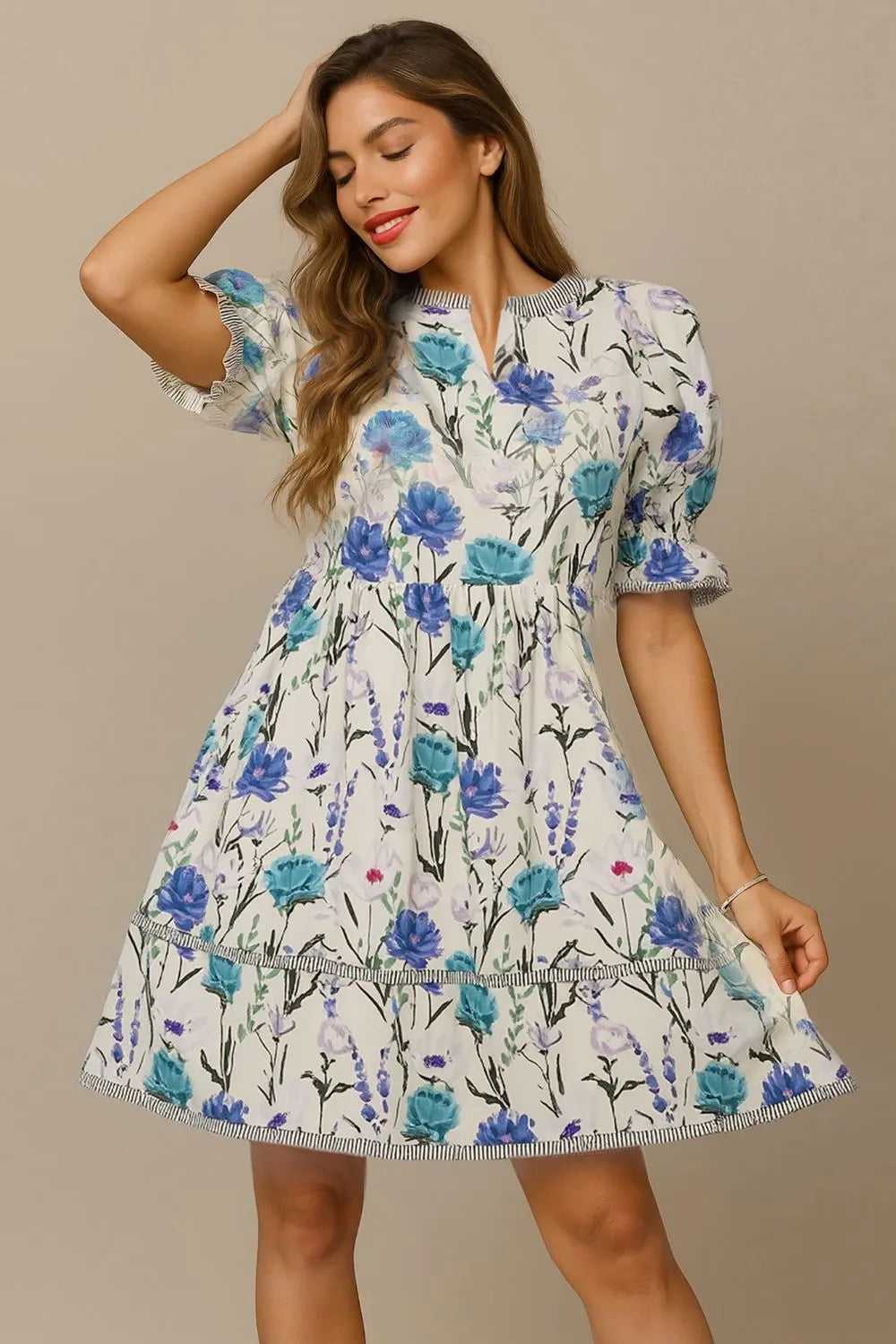 Lightweight cotton BabyDoll dress featuring puff sleeves and floral pattern in teal and purple

