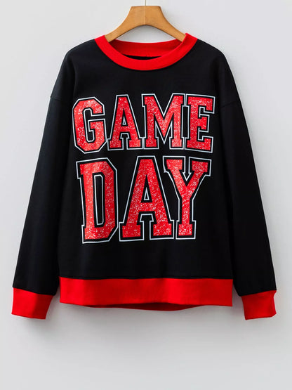 Back view of oversized Game Day Varsity Striped Detail Baggy Women's Sweatshirt