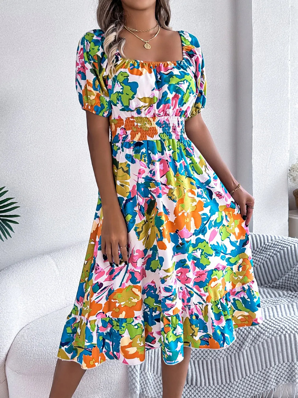 Back view of the romantic midi dress in garden setting

