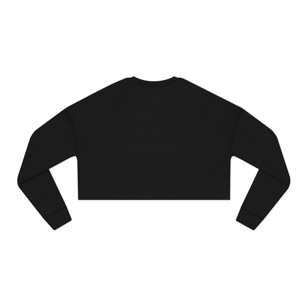 Beige cropped sweatshirt close-up highlighting the raw bottom edge and ribbed neckline.

