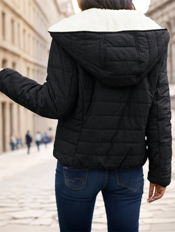 Black women’s padded coat – cozy collar, zipped pockets, clean lines