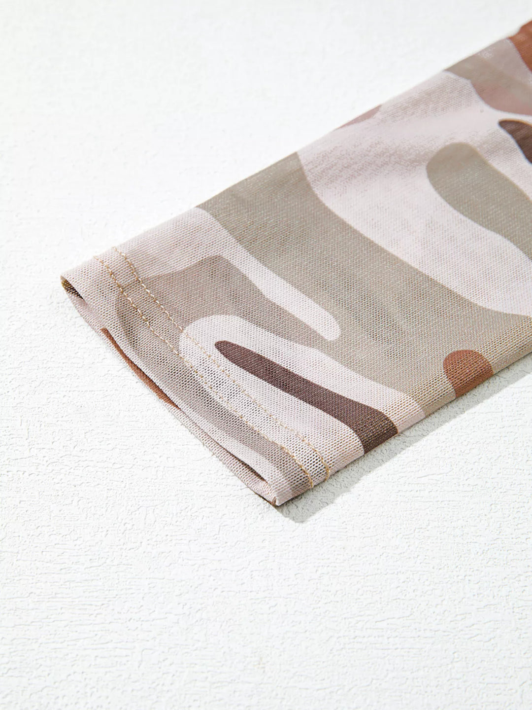 Camouflage Mesh Long Sleeve Top – stretch test on sleeve