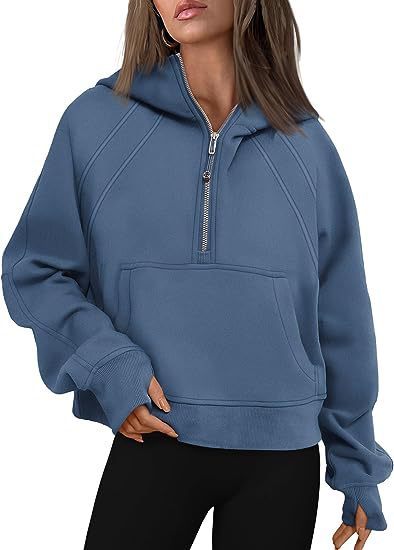 Pink women’s long sleeve hoodie styled for lounging or light exercise

