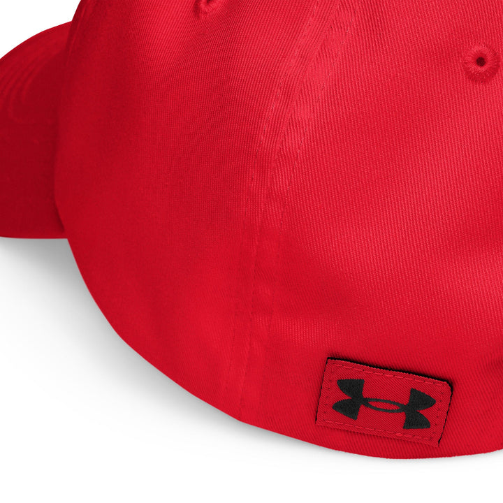 Casual fashion scene featuring male and female models wearing contrasting red and white Unisex Under Armour® Dad Hats

