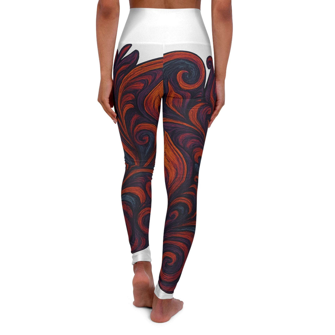 Back view of high waisted yoga leggings with bold swirl print