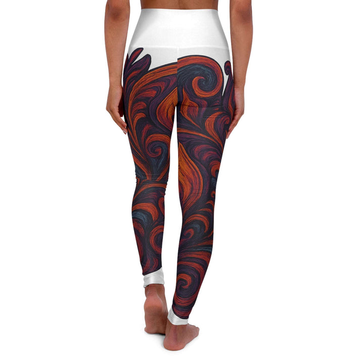 Back view of high waisted yoga leggings with bold swirl print